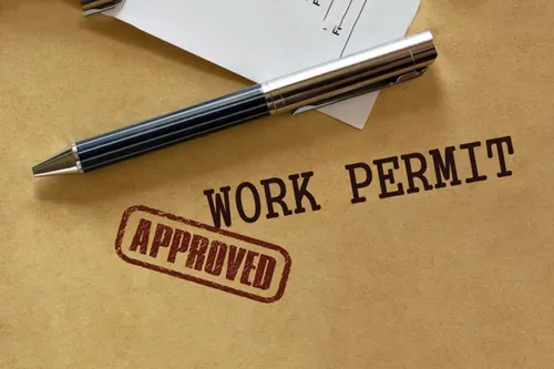 Uganda work permit classes comparison chart showing Class G permit eligibility for Nigerian applicants, fees, processing times, and requirements